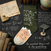 Albert Einstein sock displayed with equations, science books and models | Stand4 Socks