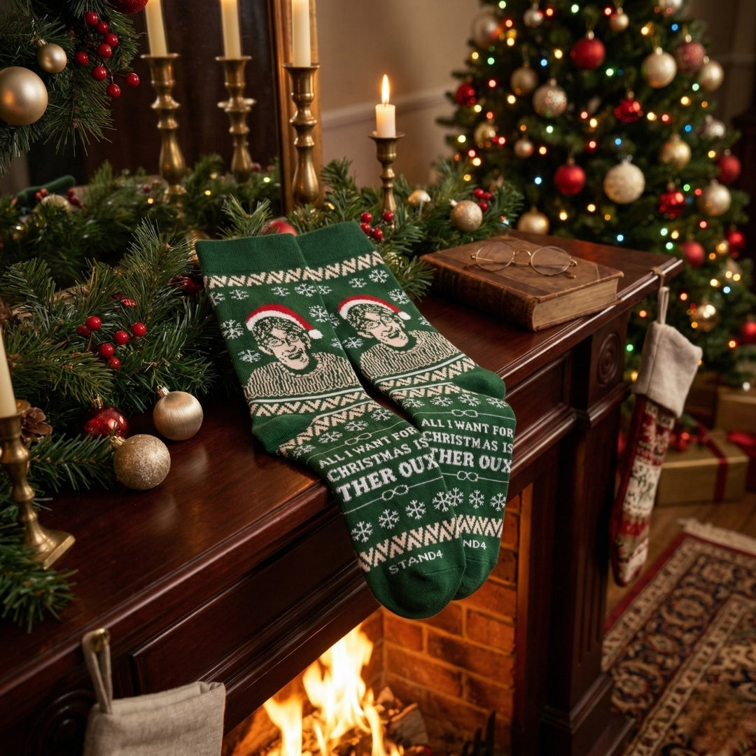 Green Christmas Theroux socks displayed by a decorated Christmas fireplace | Stand4 Socks