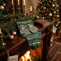 Green Christmas Theroux socks displayed by a decorated Christmas fireplace | Stand4 Socks