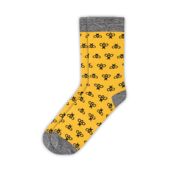 Yellow cotton crew sock with repeating black bee pattern and grey trim | Stand4 Socks